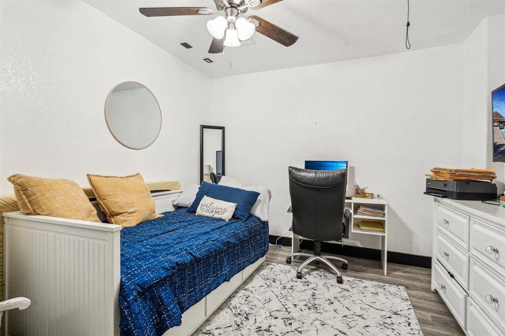 The sellers converted 1/2 of the garage to an air conditioned room, ceiling fan, and electrical outlets.