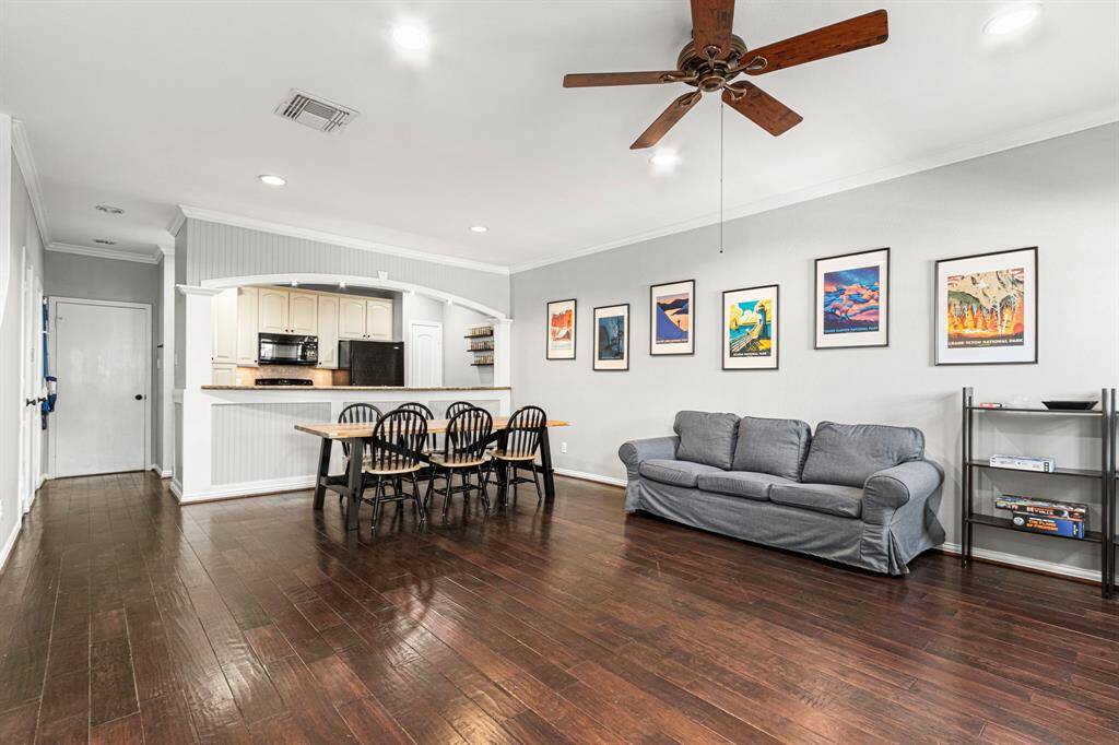 Experience modern living with elegant wood floors, sleek recessed lighting, and stylish designer paint throughout.
