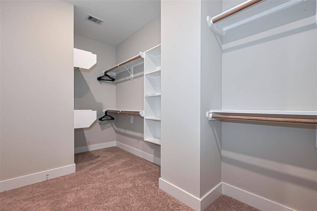 Huge spacious closet in primary bedroom