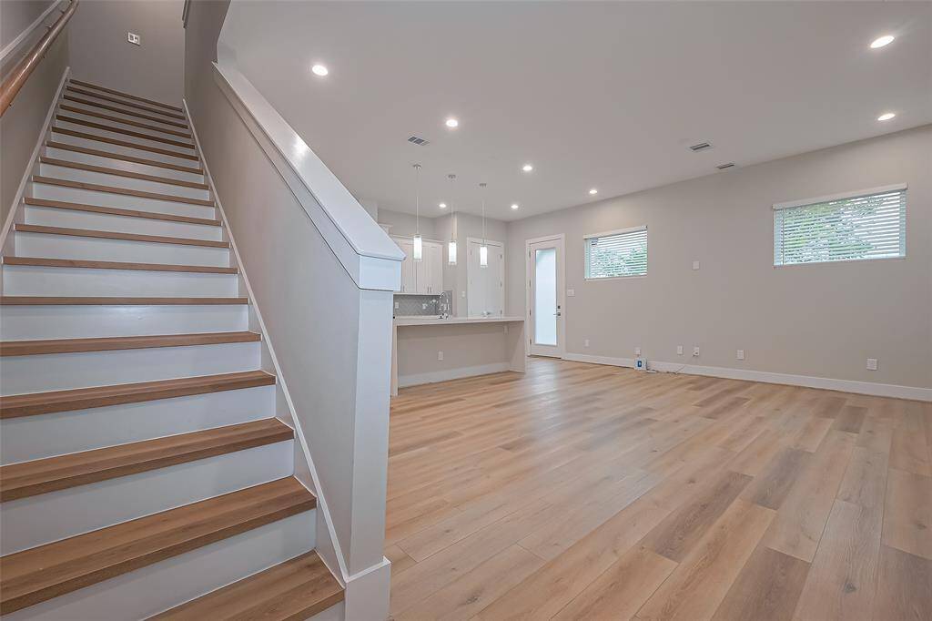 Wood stairs leading you to all bedrooms