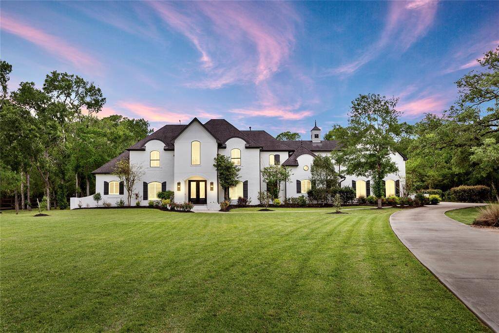 Your Dream Home awaits! 8619 Hidden Hollow is situated on 3.7 acres in Sienna Point.