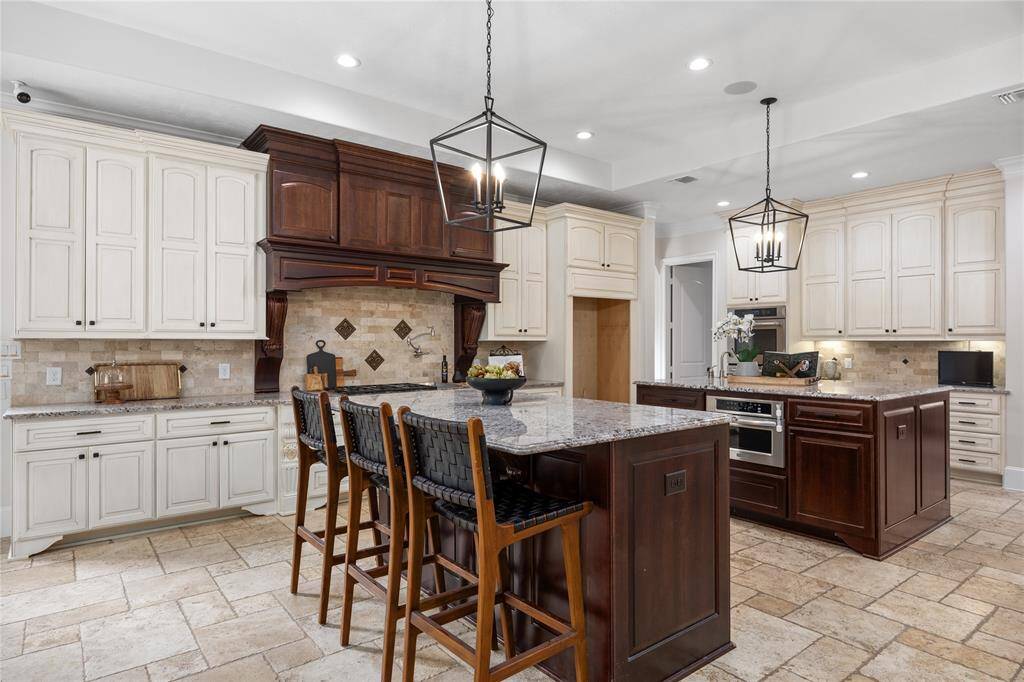 Double Island kitchen is a gorgeous statement while being super functional at the same time! Benedettini Cabinets are an amazing feature in this kitchen...and they have all been baby/toddler proofed.