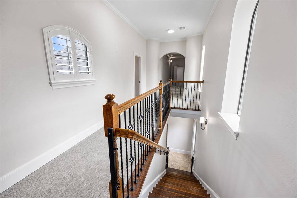 View of the 2nd staircase leading into the Massive Gameroom.