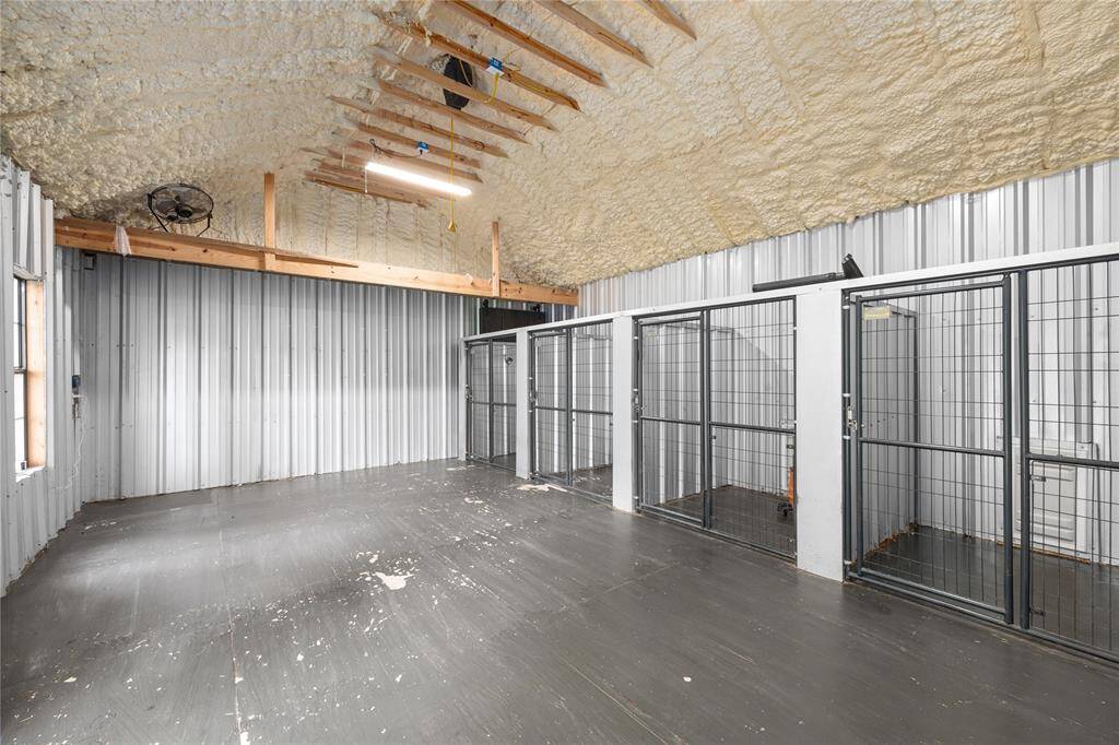 Perfect for your fur-babies, or turn this into the ultimate man-cave or she-shed! Notice the added spray foam ceiling helping to regulate temperature inside.