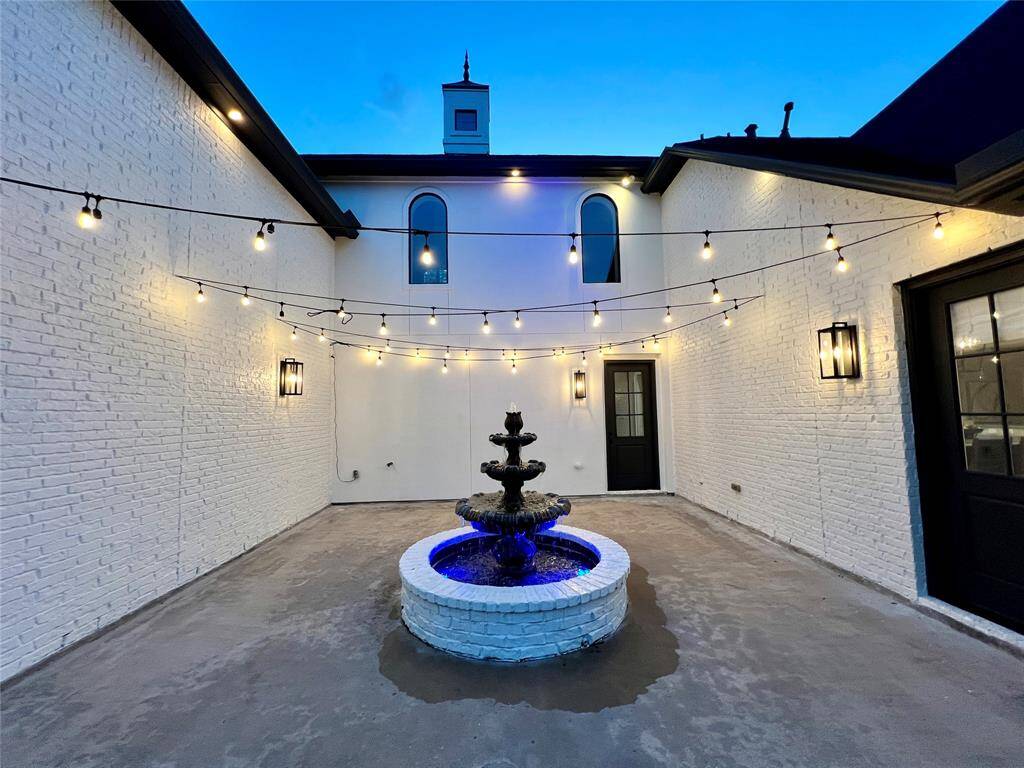 Frech Quarter Inspired courtyard is a gorgeous and striking feature to this home!