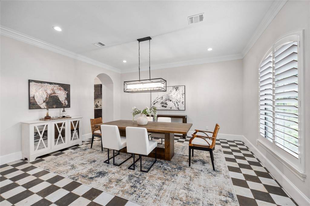 Brand New tile flooring in this well designed formal dining room.