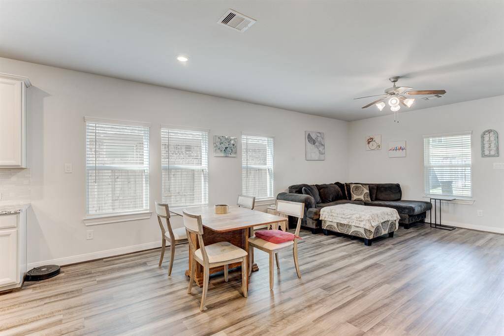 Dining area is between the family room and the kitchen.