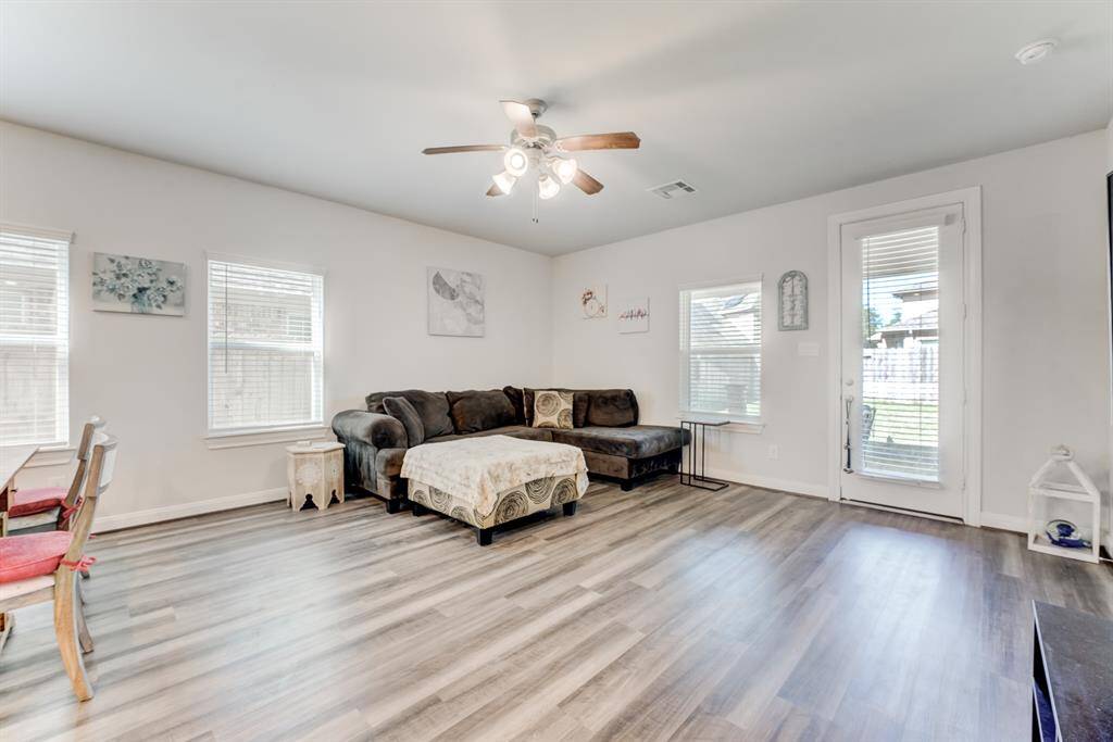 Living area is off the back of the home offering a view to the back yard.