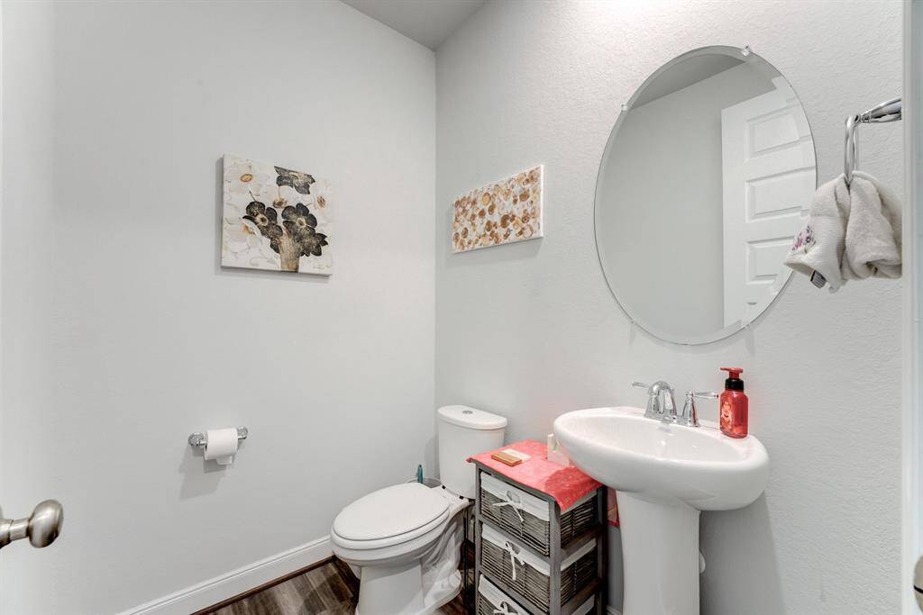 Half bath downstairs is across from the stairs.