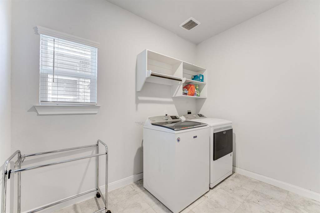 Large utility room offers plenty of room for a folding table.