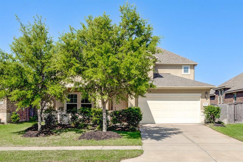 Front yard has a sidewalk for morning walks or jogs.
