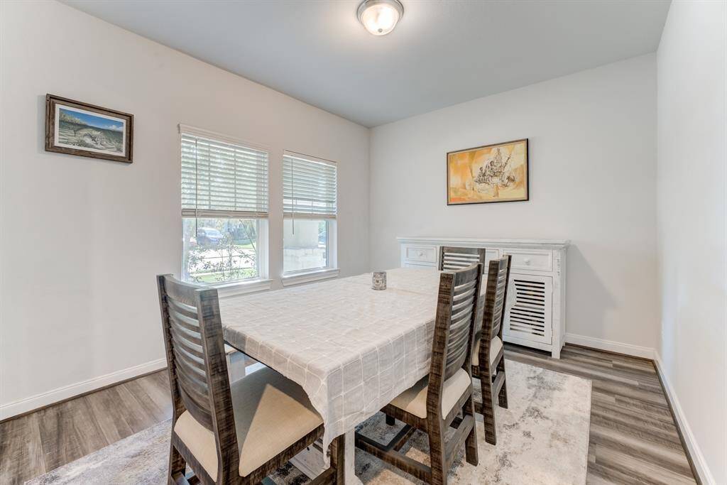 Formal dining room has a view of the front yard and is located at the front of the home.  Room could also be used as a home office.