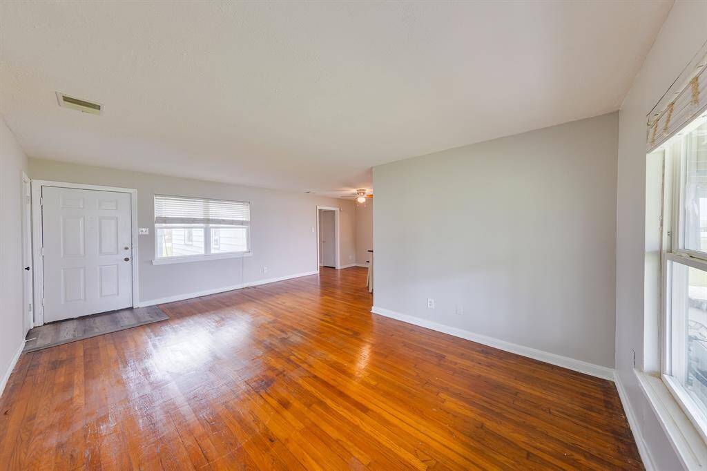 Original hardwood floors. Strong bones! Beautiful layout! Lovely ONE story home on a large lot!