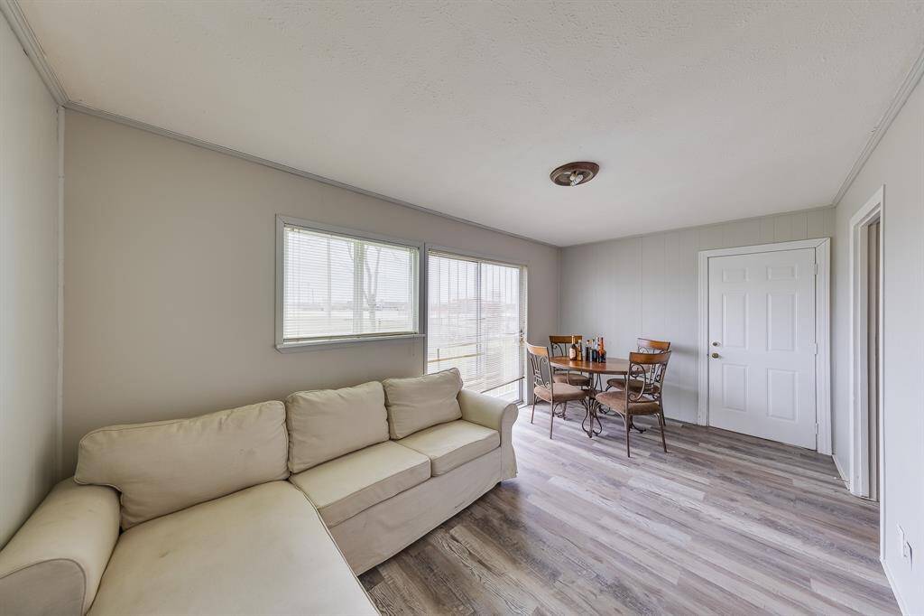 NEW FLOORING IN FORMAL DINING ROOM + EXTRA SPACE could be used as an office or second living room.