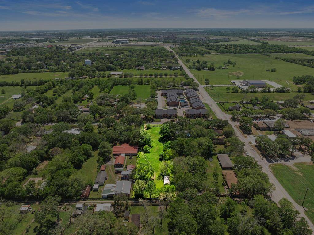This aerial view captures the depth and scale of the lot, emphasizing its prime positioning and surrounding greenery—ideal for creating a private retreat or innovative build.