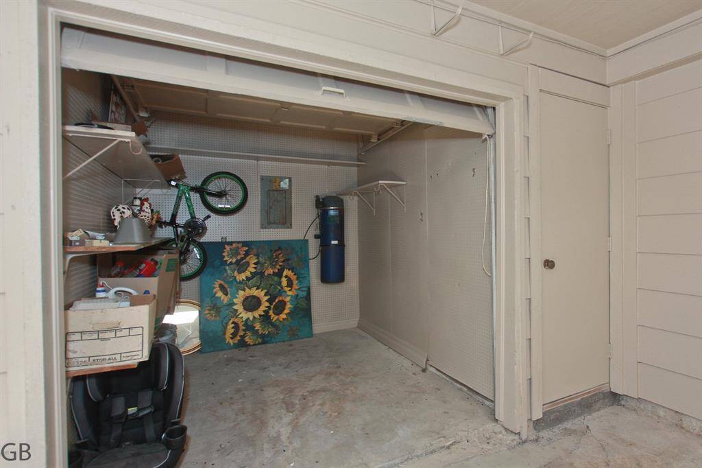 Gold cart storage from two car garage.
