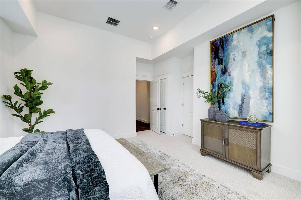 Serene Master Suite: A tranquil and spacious retreat featuring elegant accents and ample natural light.