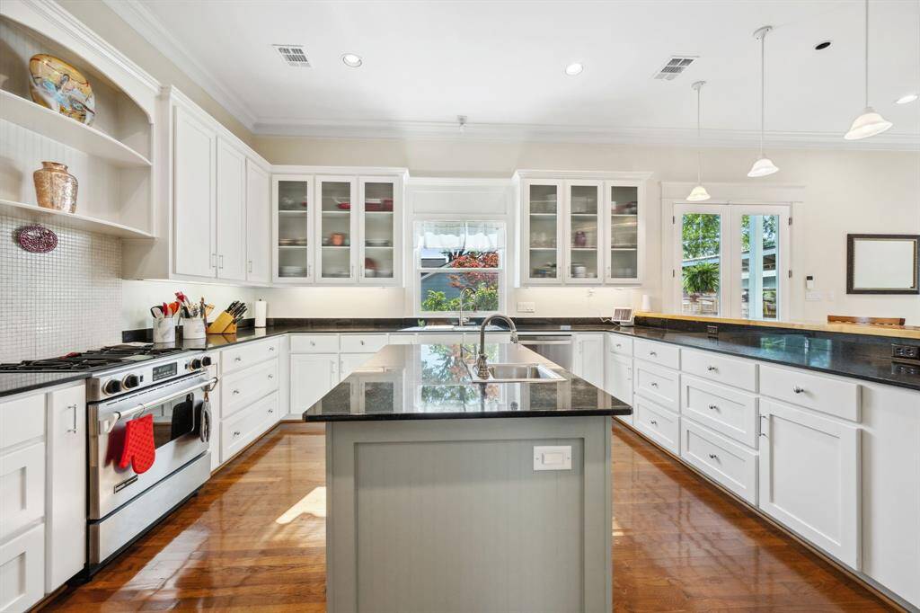 Designed with generous prep space, the kitchen caters to both everyday functionality and effortless entertaining.
