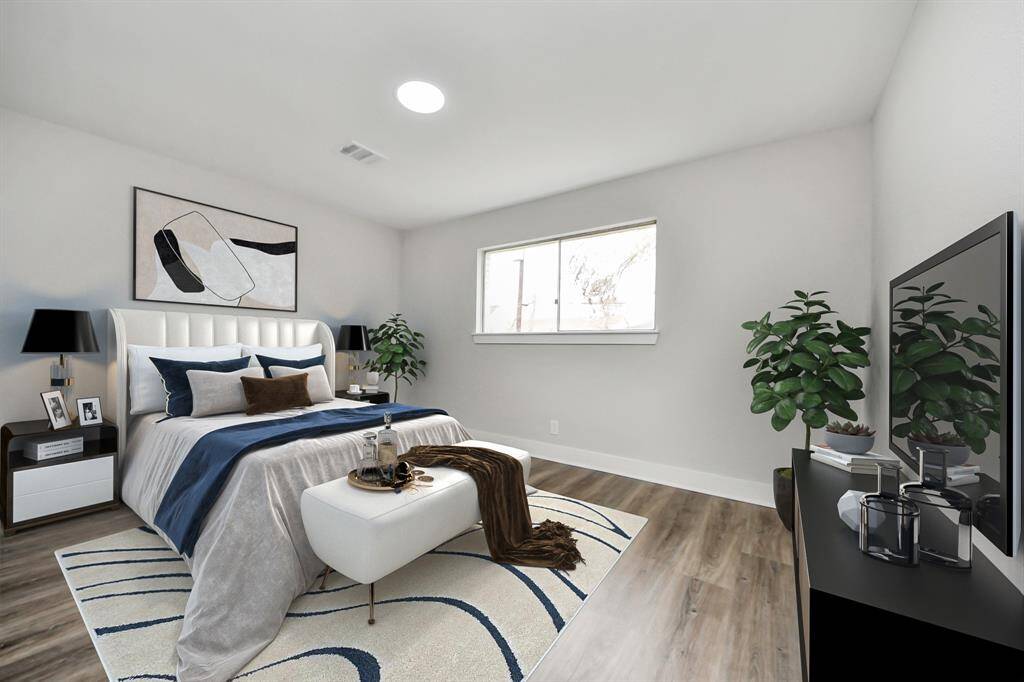 Relax and unwind in your primary bedroom space. This space has been virtually staged.