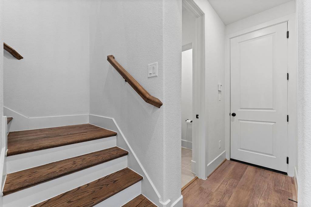 The staircase is located in the rear of the home for convenience. Upstairs you will find a spacious game room, loft flex area, bedroom, and full bathroom.