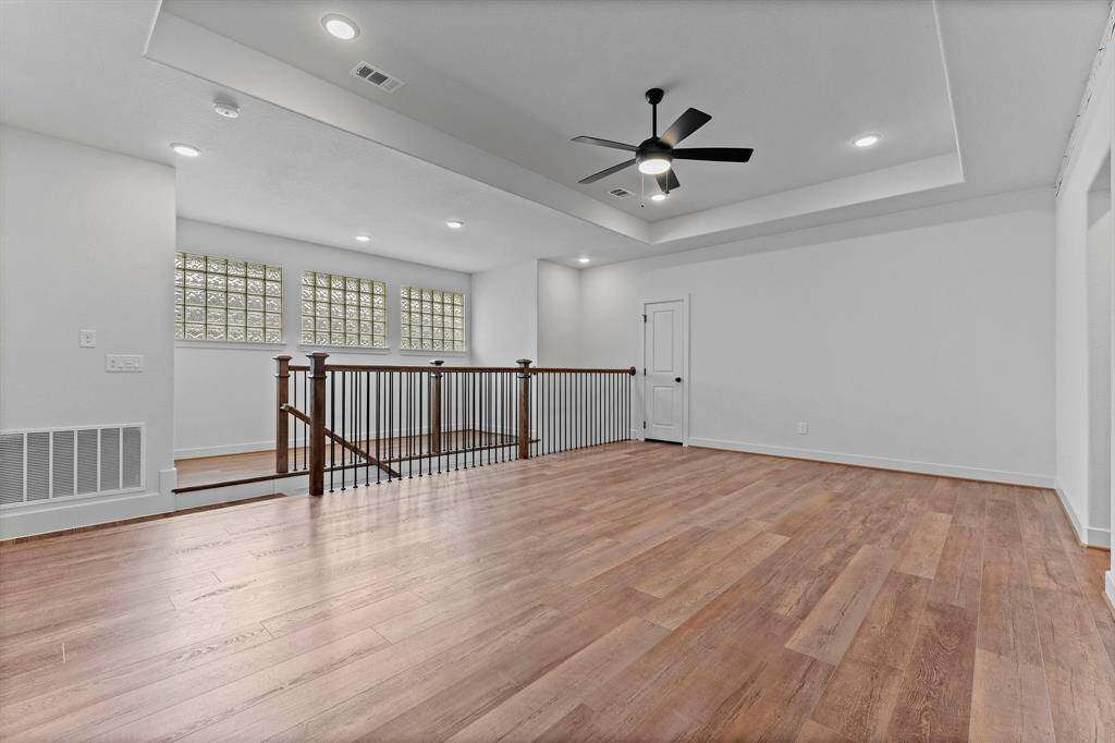 The extra-large Game Room upstairs is the ultimate spot for fun and entertainment! Whether it's a ping-pong match, family movie night, or just relaxing with friends, this spacious room offers endless possibilities. You can easily fit a large ping-pong table or a comfy couch and TV, with plenty of extra space for a small study area or even a snack bar in the partitioned section by the stairs.