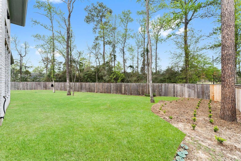 So much yard on this pie-shaped lot! Lush green grass for the play yard, dog house or picnic table! Front and back irrigation system for easy lawn maintenance. The home has never had termite damage, but a plan is in place with bait stations as a procautionary measure and the plan can be transferred to the owner.