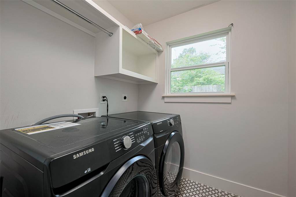 Functional laundry room with built-in storage and organized space for your essentials.
