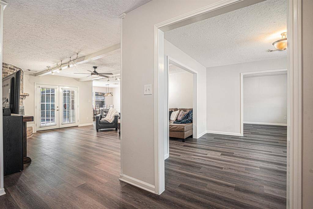 View of living rm, dining, & family rooms