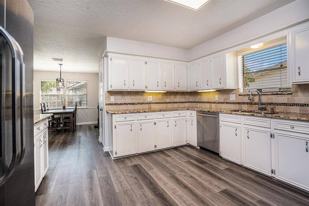 Another view of spacious kitchen