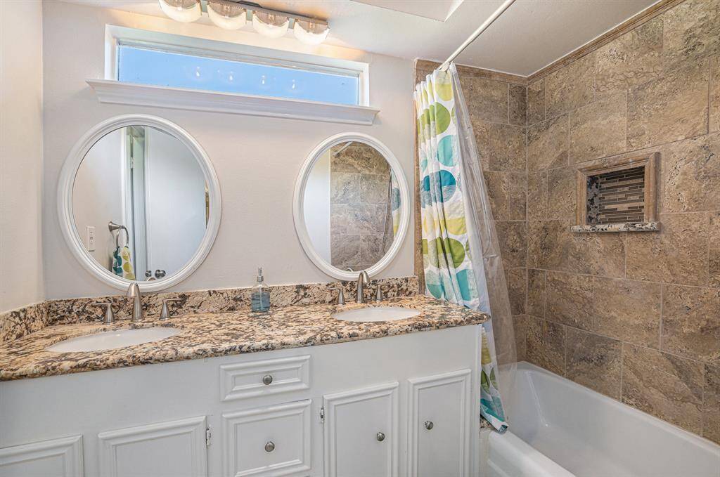 Upstairs Bathroom with double sinks & granite counters