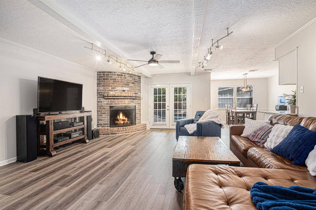 Spacious family room w/brick fireplace