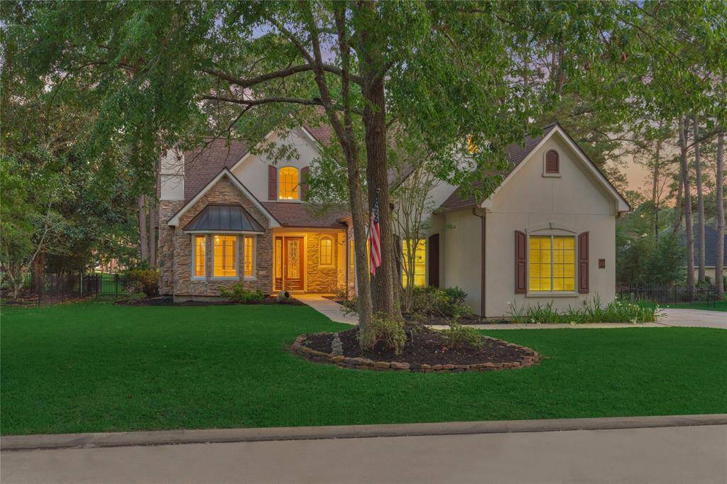 Nestled within the prestigious gated community of Bentwater, this stone and stucco custom home offers the perfect blend of comfort and tranquility.