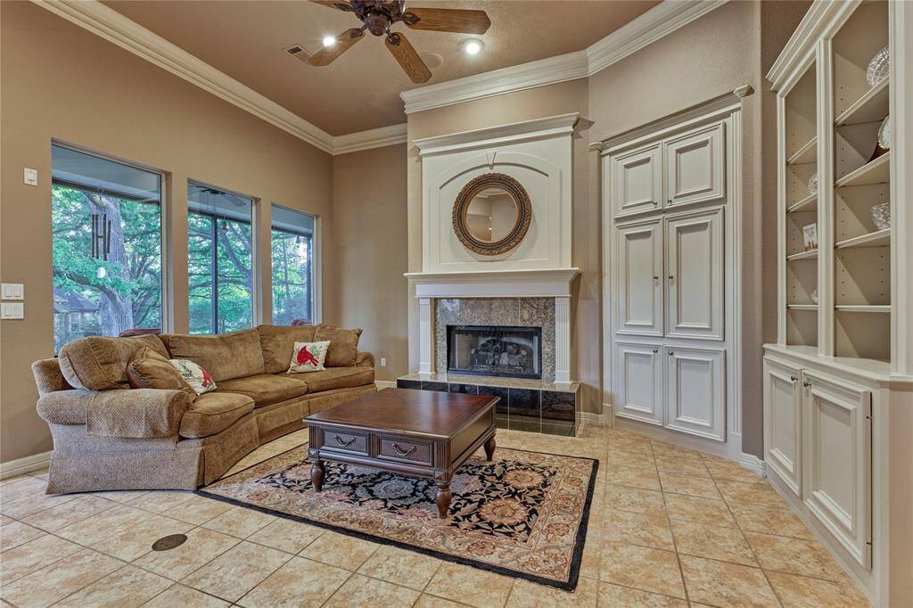 Cozy up by the inviting fireplace, perfect for fall and winter warmth.