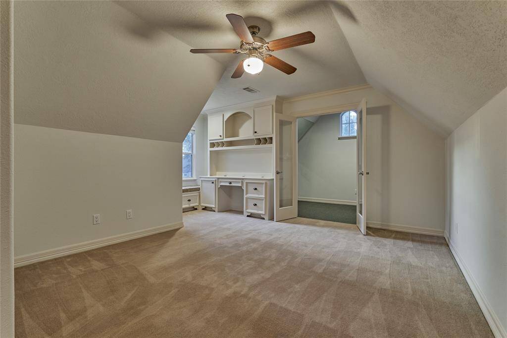 Massive secondary bedroom with study area, window seat and walk-in closet.