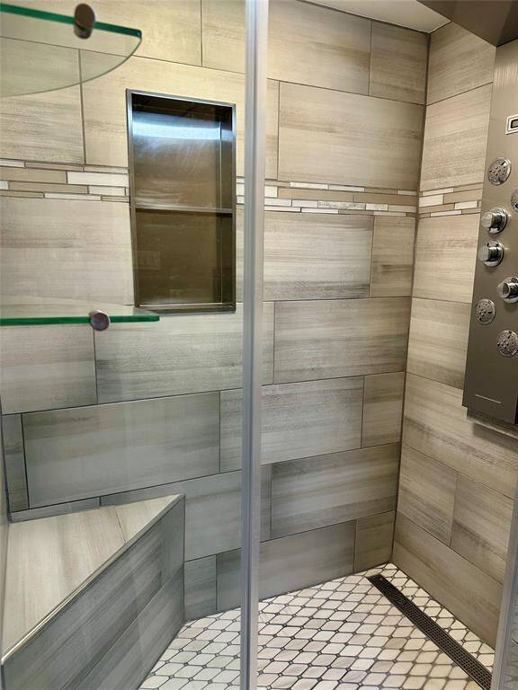 Recently remodeled custom primary suite shower.