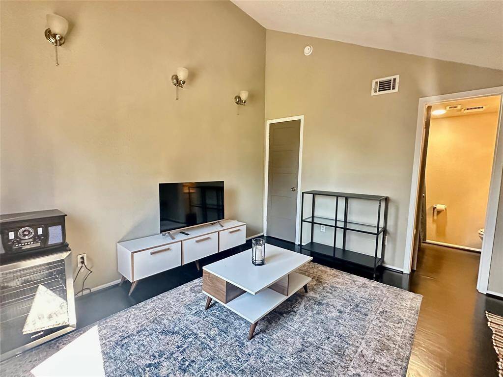 Second floor loft, den, room or game room.