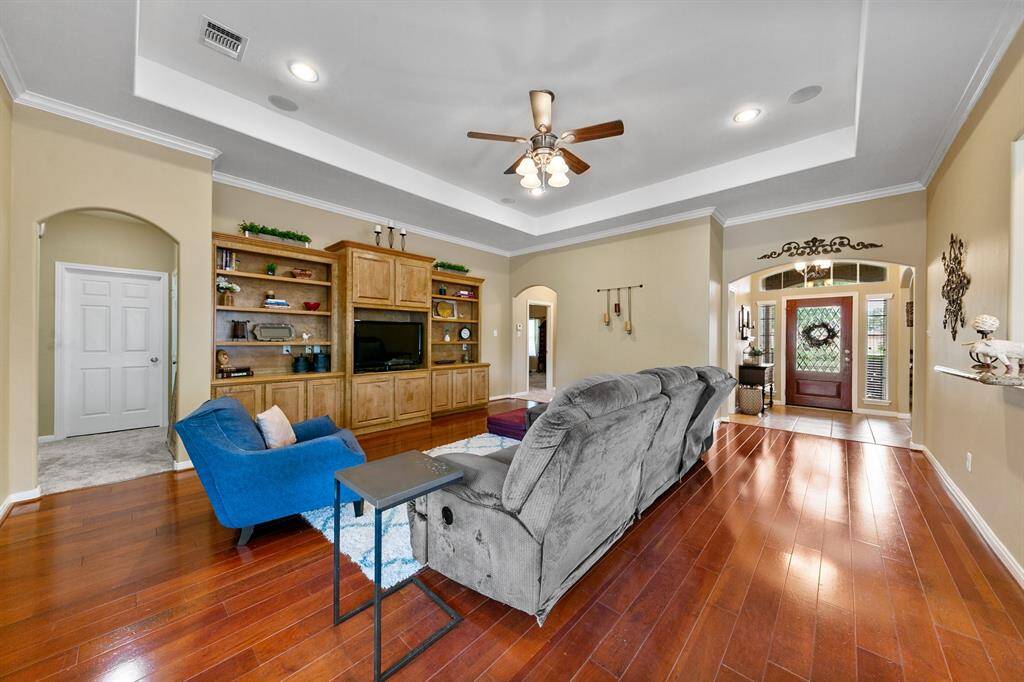 Enjoy spending time watching movies and having fun family game nights here in this comfortable living room space.