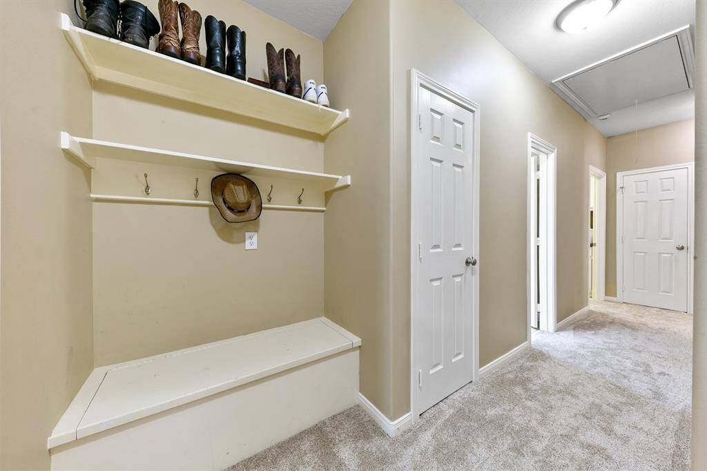 The perfect nook for back packs, purses, shoes, hats with additional storage in the seated space.