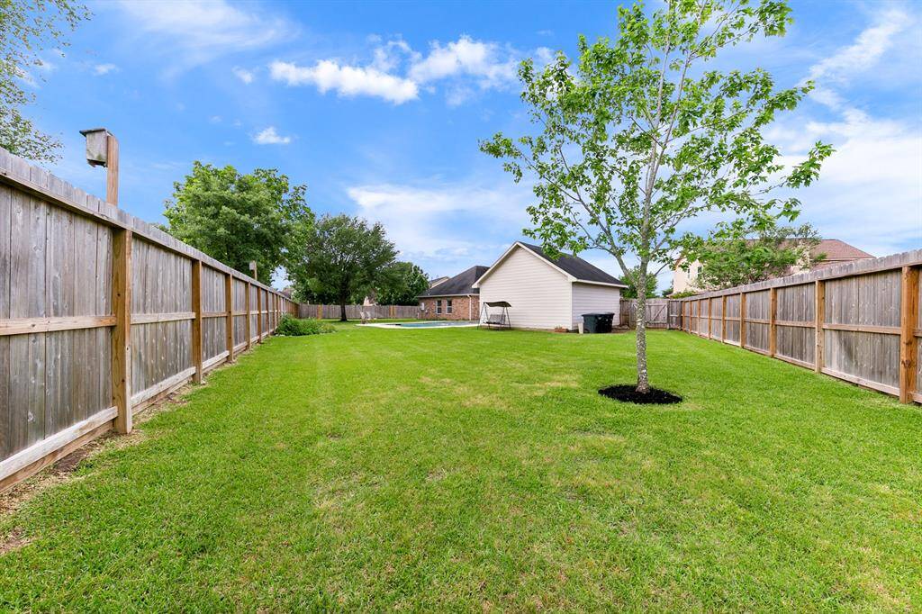 Another view of the incredible fenced backyard