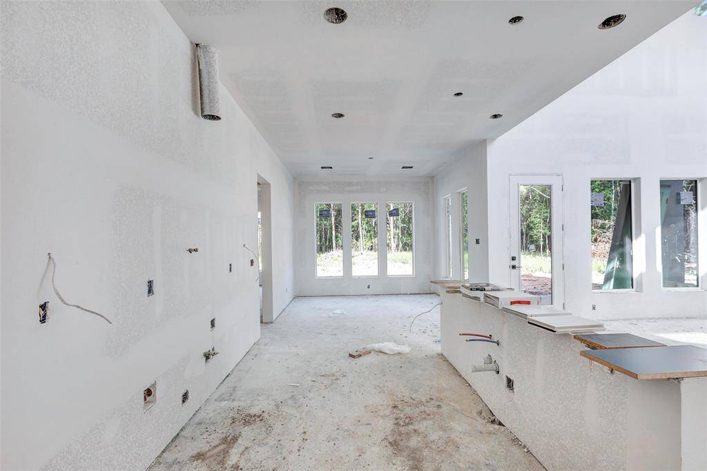Bright and open kitchen are with soaring vaulted ceilngs.