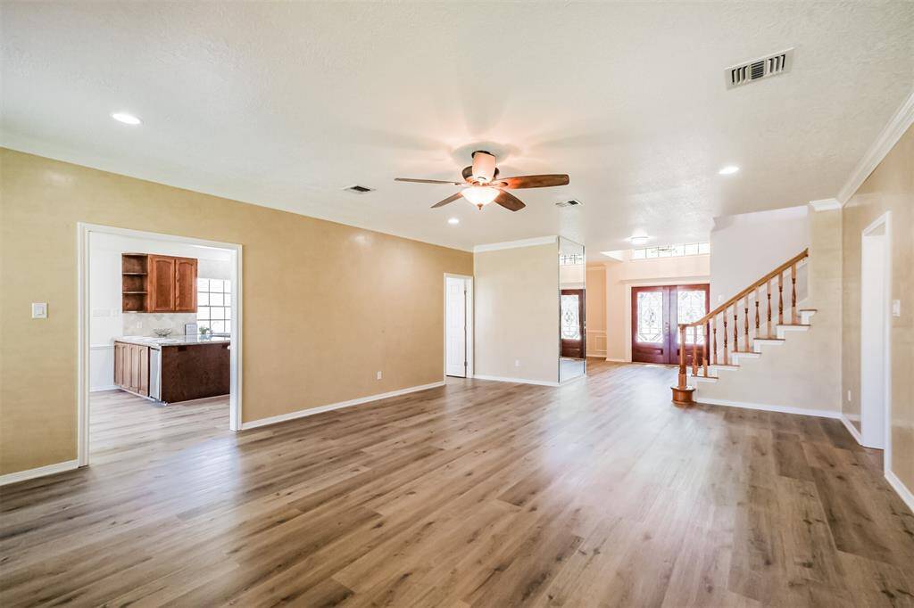The family room has direct access to the breakfast room and kitchen. Updated lighting and brand new ceiling fans in most rooms!