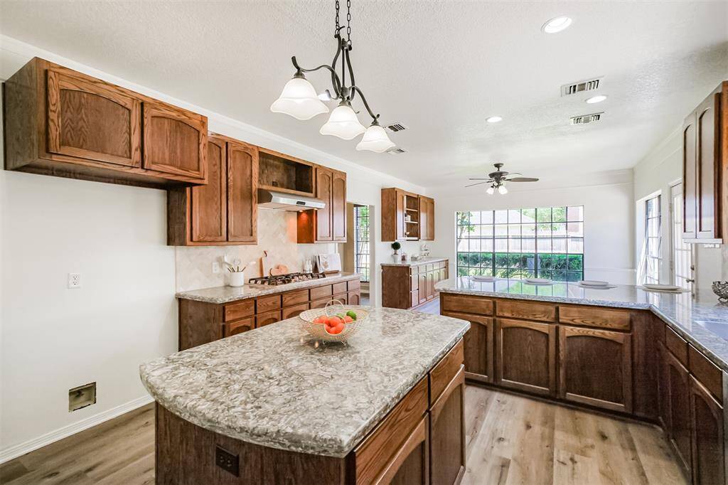Large kitchen island provides great food prep space.