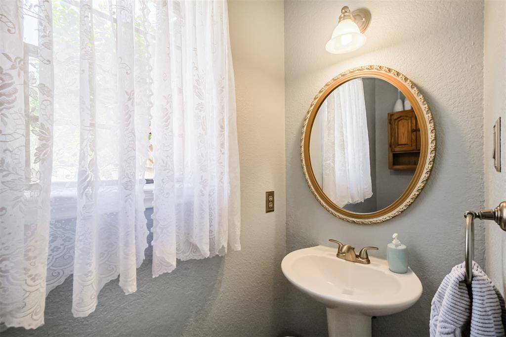 Guest half bath conveniently located on the first floor.