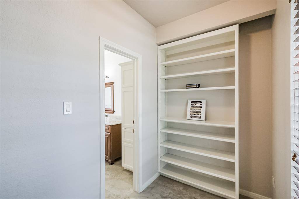 One of two closets in the primary suite.