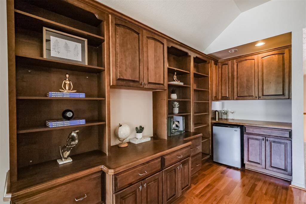 Several of the drawers are designed for file storage while the shelves provide ample display opportunities.