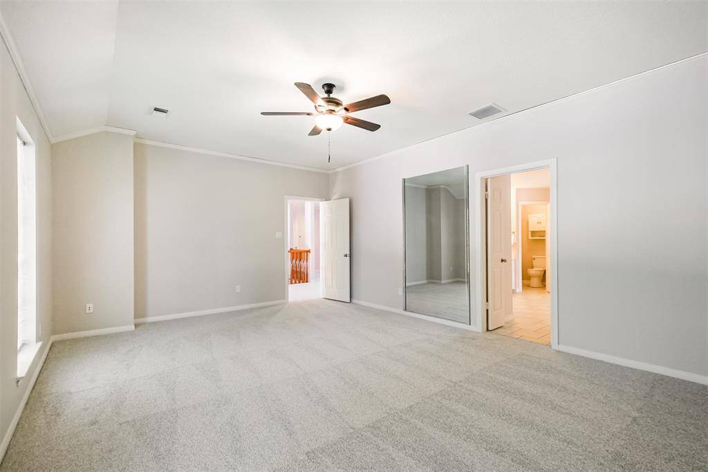 The second primary, located upstairs, has fresh paint and new carpeting.