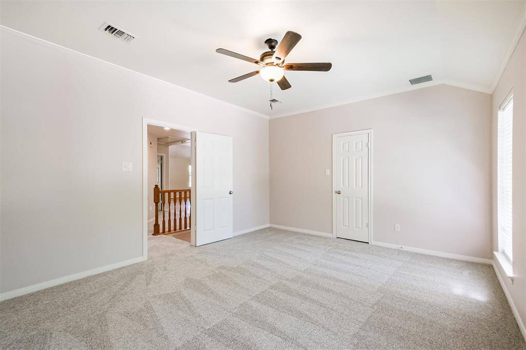 The third secondary bedroom showing the location of the walk in closet.