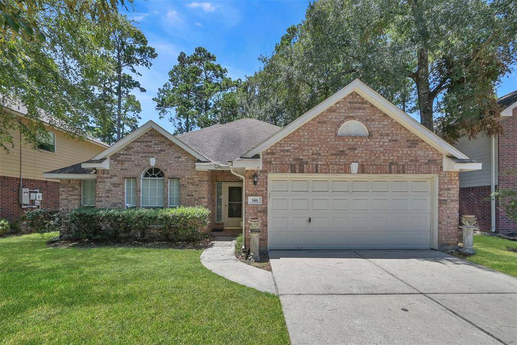 Discover effortless living with a charming, low-maintenance home featuring comprehensive sprinkler systems front and back.