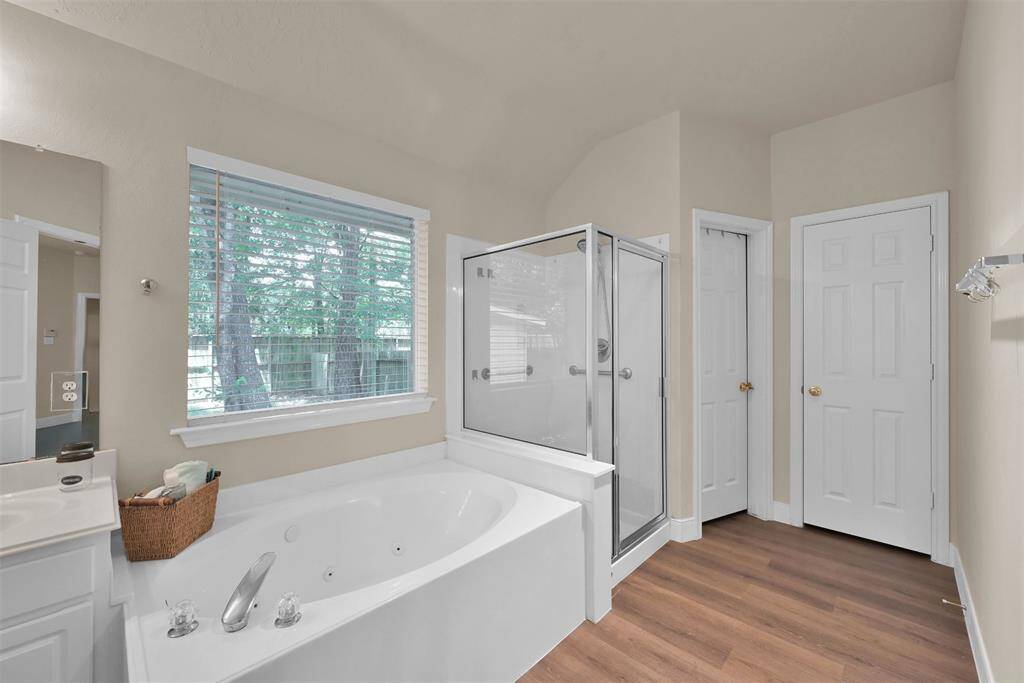 Separate garden tub and shower in Primary bathroom