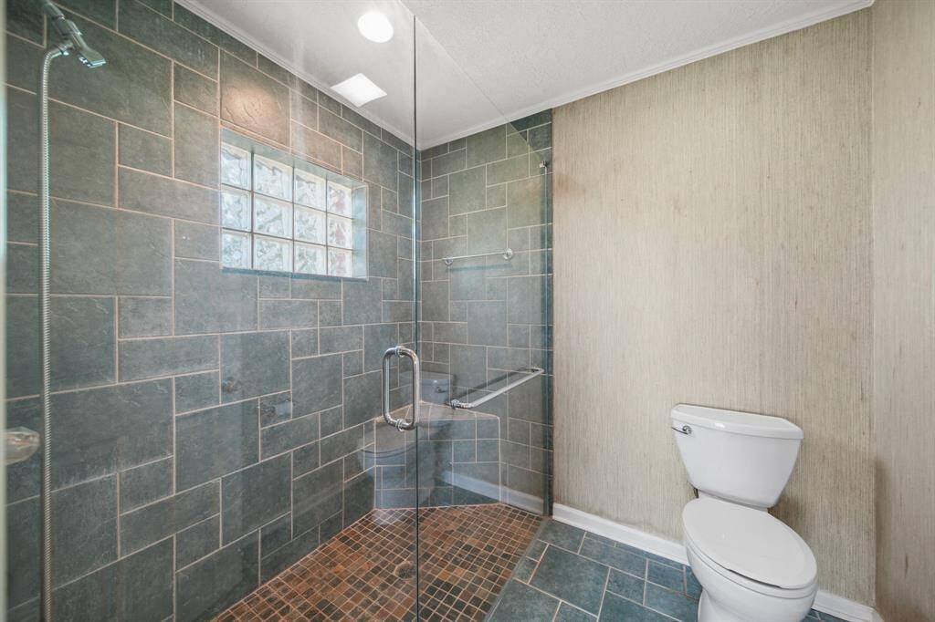 The other side of the Primary Bath is a large custom Shower